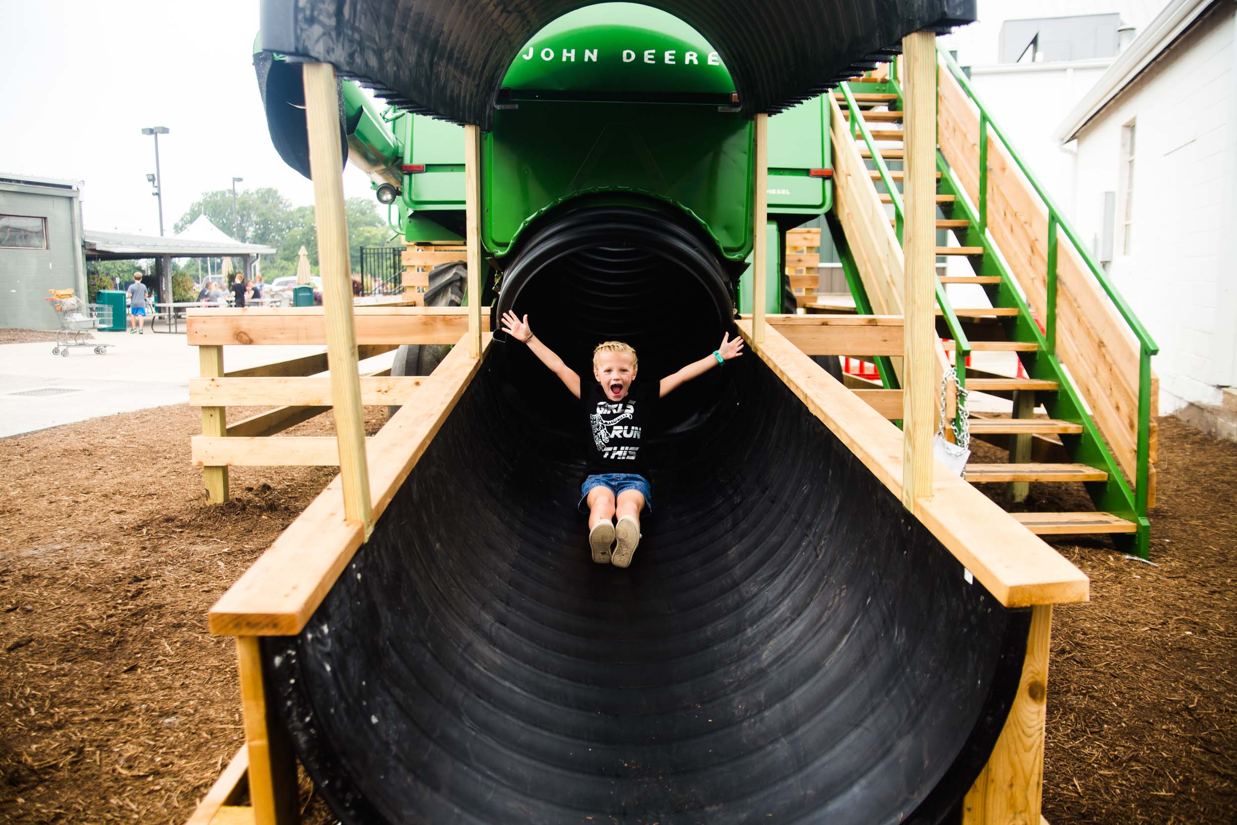 A picture of a child on a slide