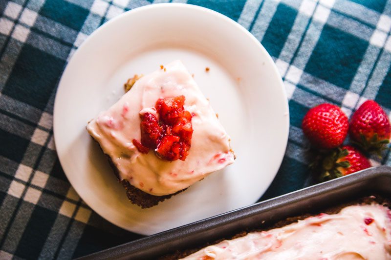 A Slice of Strawberry Cake with Strawberry Cream Cheese Frosting